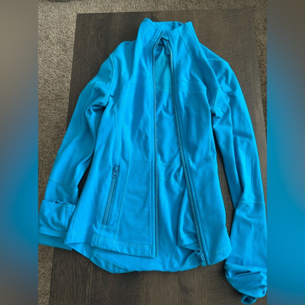 Older small lululemon define jacket in a bright blue color